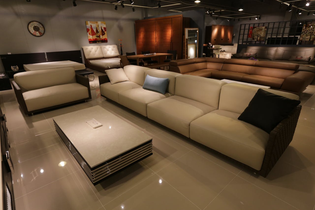 Home Elegant living room showcasing modern furniture with plush sofas and ambient lighting.
